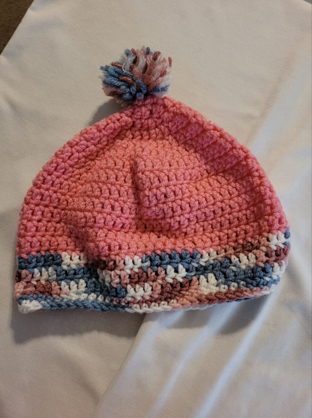 Cozy Pink Crochet Pom Beanie with Multicolor Trim